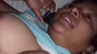 Big boobed Indian prostitute talking on phone during sex video