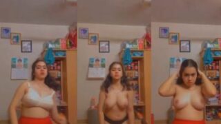 A girl strips to record her MMS in Bangla sex